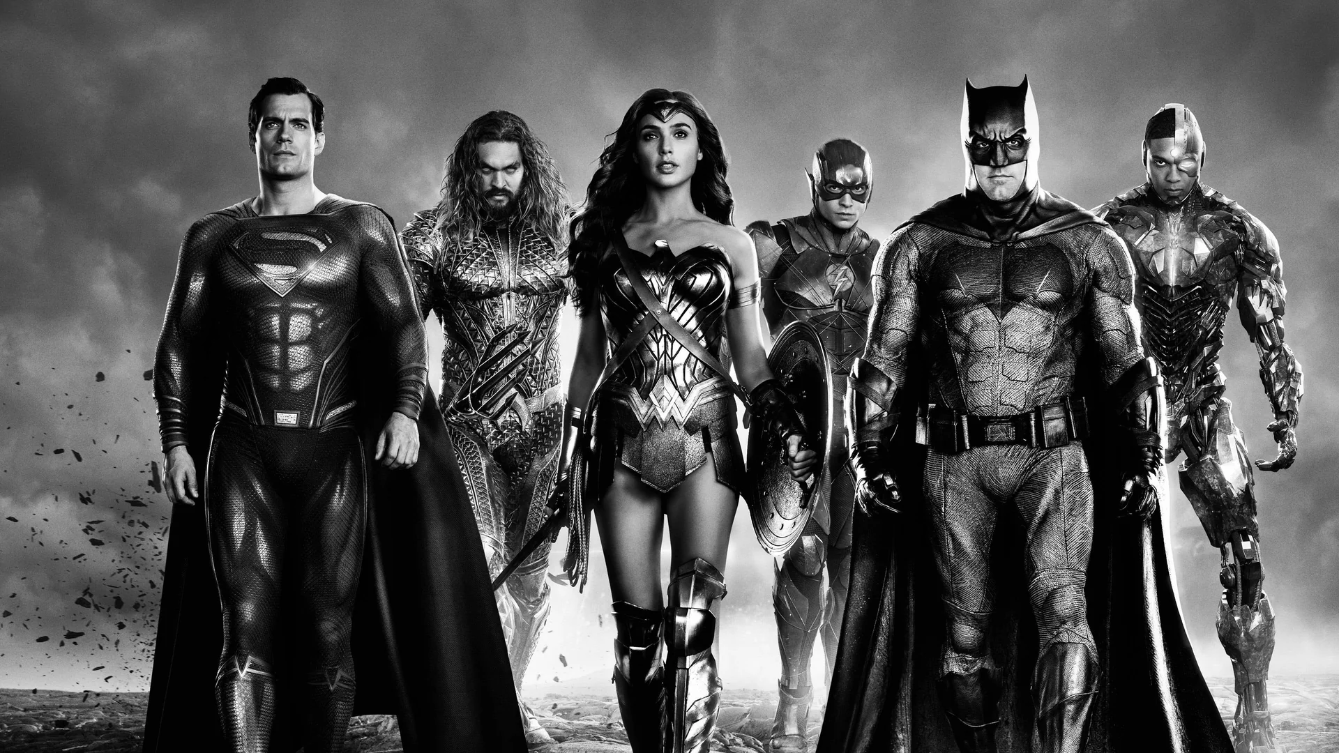 The Justice League standing together against a bleak, red sky, symbolizing unity and defiance.