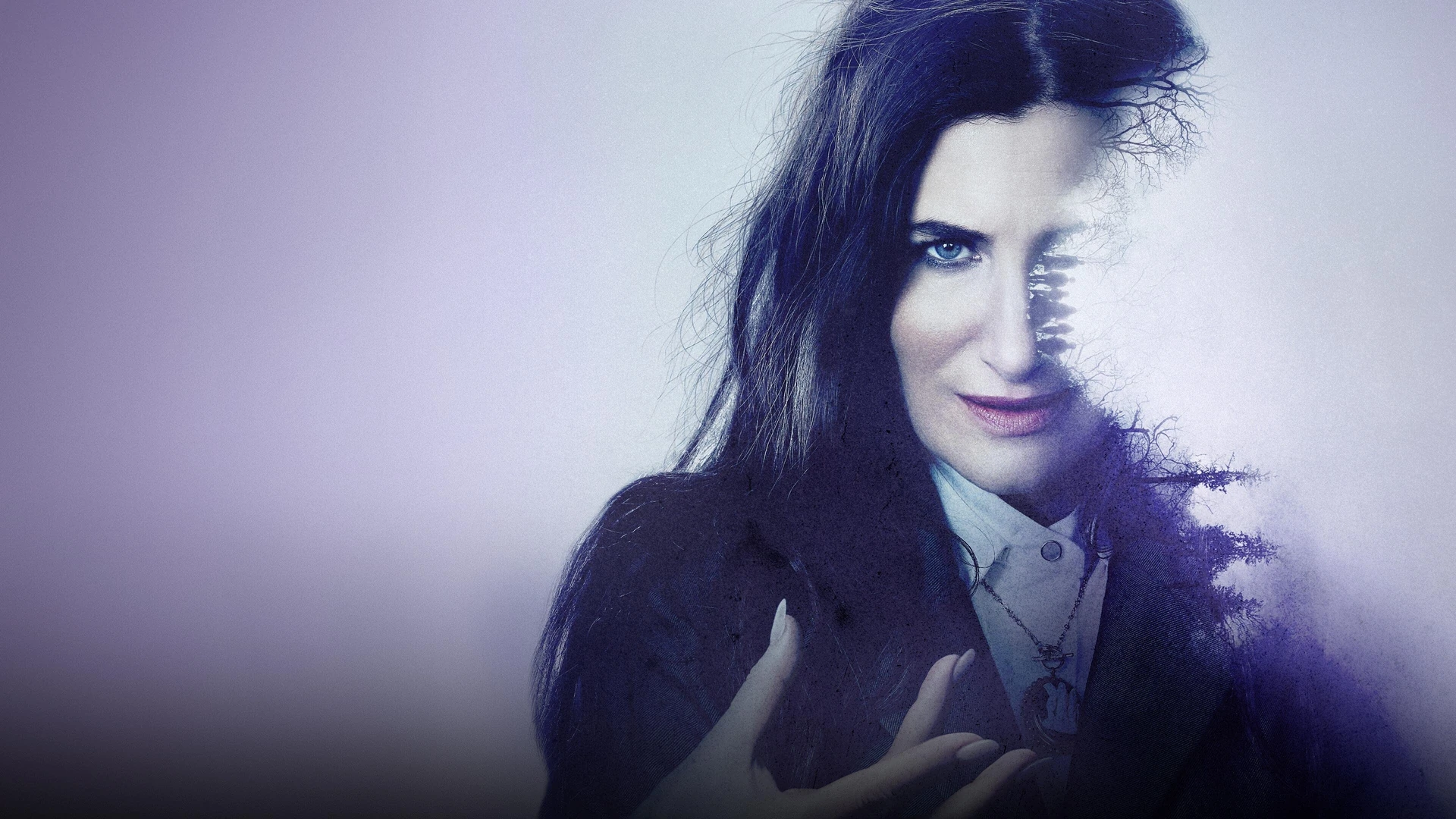 Agatha Harkness, cloaked and powerful, leading a group of witches down a shadowy path