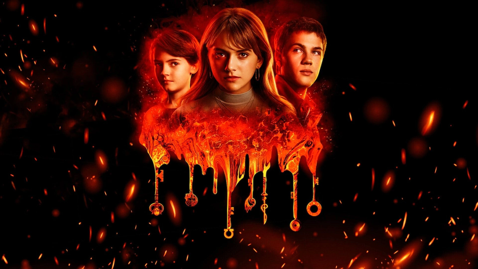 The Locke siblings discovering a magical key in a mysterious old house