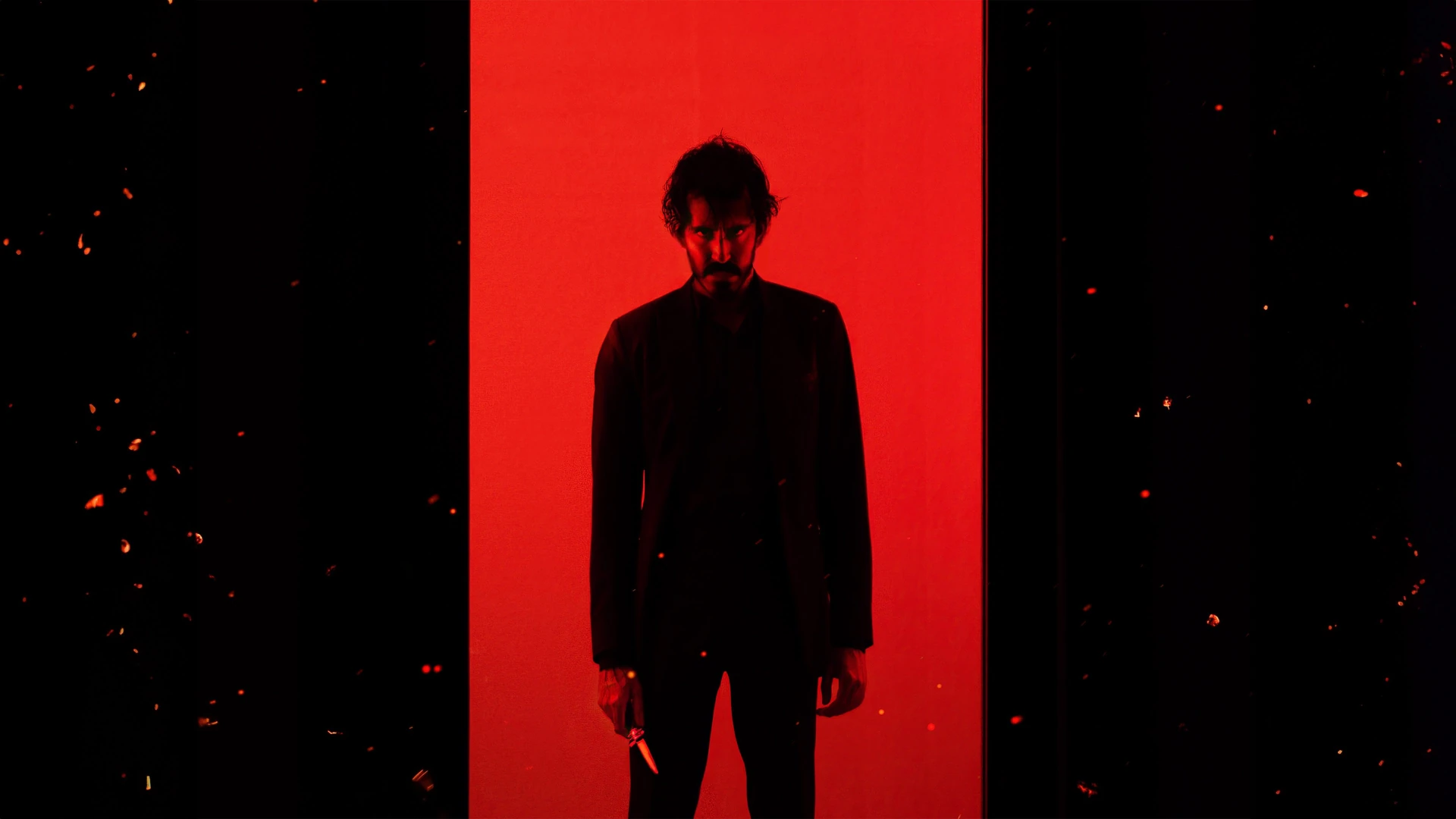 Dev Patel as Kid, intensely focused in a fight scene from Monkey Man